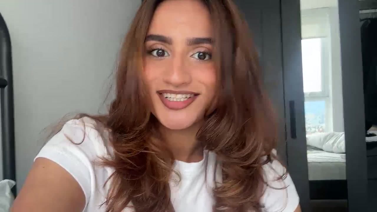 Ananya smiling at the end of her meritt video testimonial